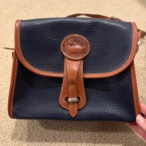 Dooney & Bourke vintage Navy and Tan all weather leather medicine style bag